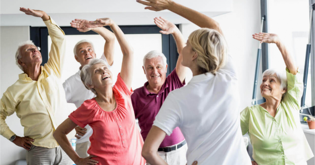Seniors doing aerobic stretches for exercise